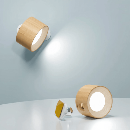 Wireless wall lamp featuring a minimalist design, 360° rotation, and dimmable LED, perfect for modern home decor and versatile lighting solutions. Recharge 2
