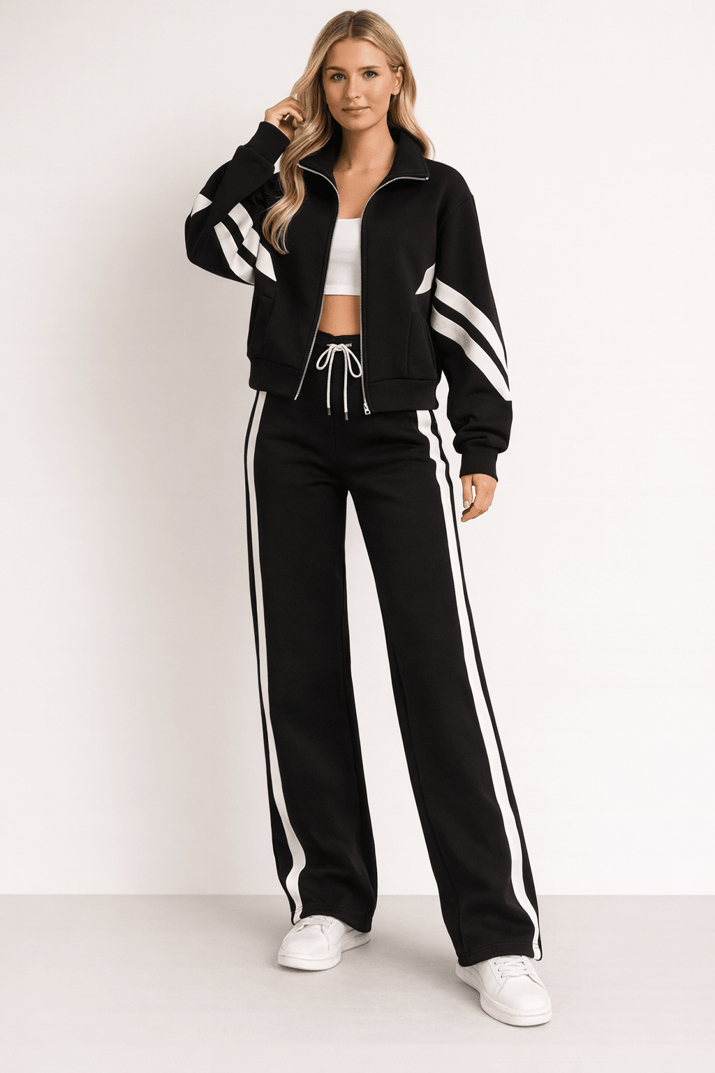 Women's 2-Piece Training Set featuring a stylish zipper jacket and wide leg pants, designed in a modern sporty style with contrasting stripes for a chic workout 1