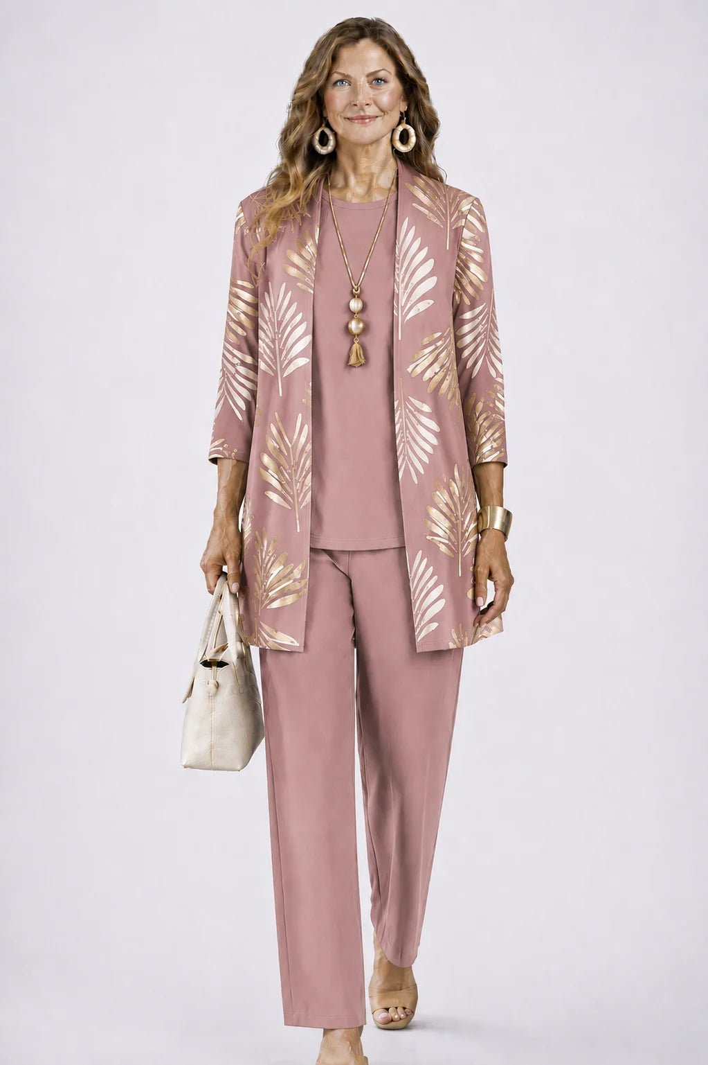 Women's 3-piece outfit set featuring a lightweight cardigan, a stylish tank top, and printed trousers, perfect for smart casual occasions. 11