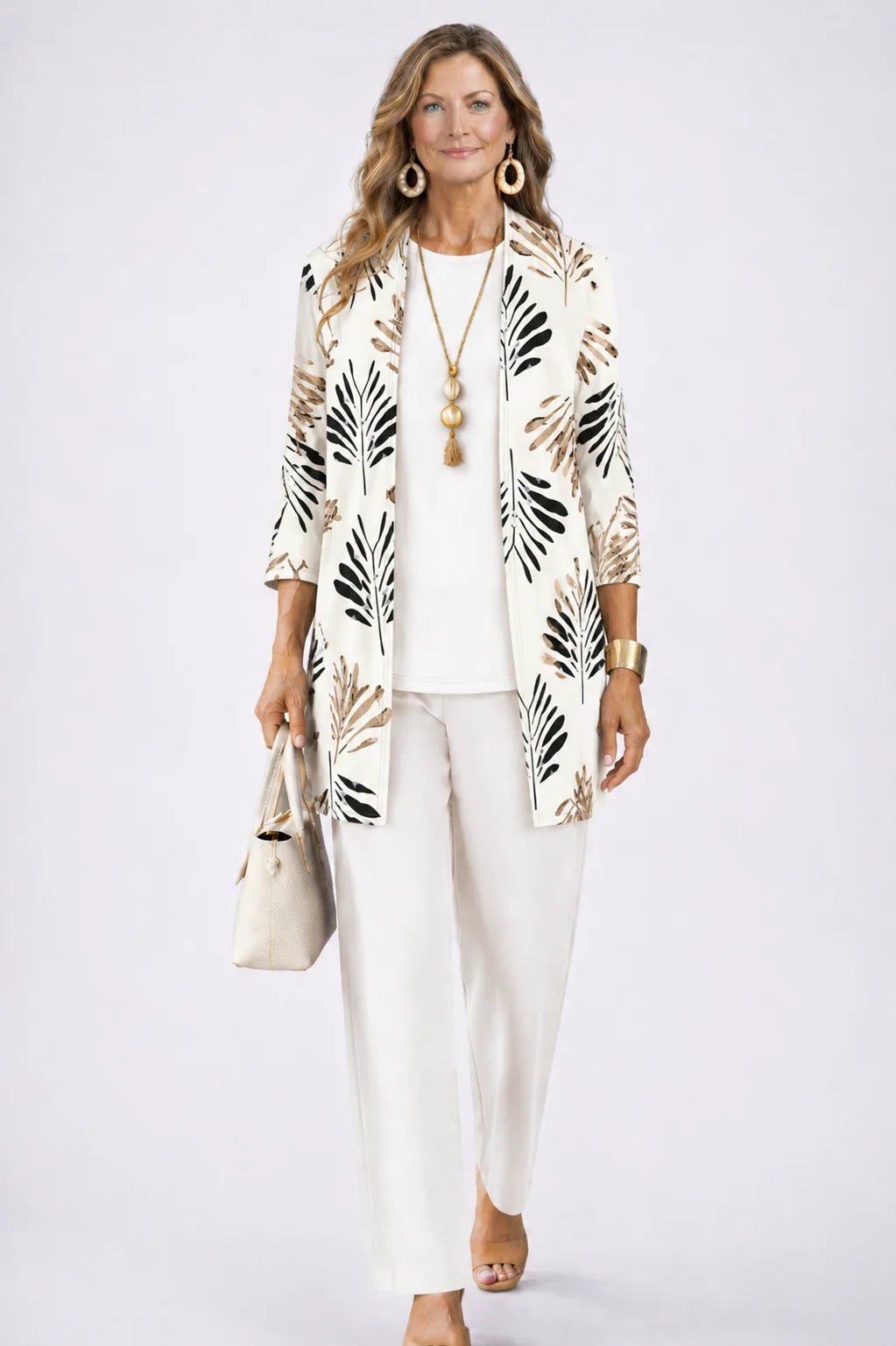 Women's 3-piece outfit set featuring a lightweight cardigan, a stylish tank top, and printed trousers, perfect for smart casual occasions. 14