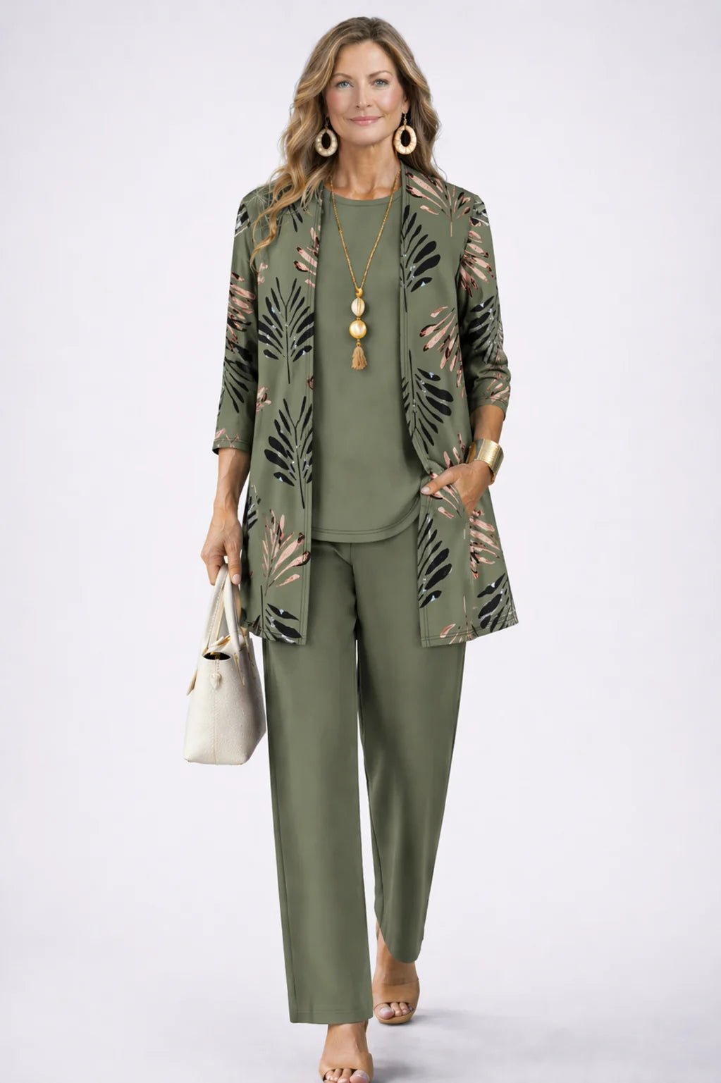 Women's 3-piece outfit set featuring a lightweight cardigan, a stylish tank top, and printed trousers, perfect for smart casual occasions. 1