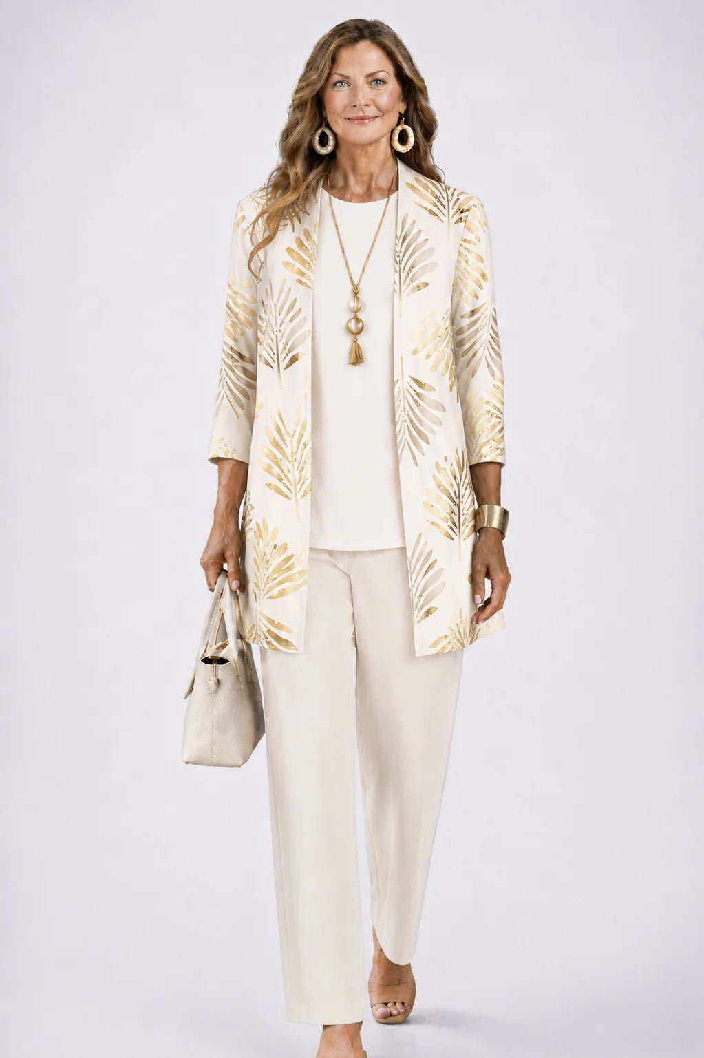 Women's 3-piece outfit set featuring a lightweight cardigan, a stylish tank top, and printed trousers, perfect for smart casual occasions. 13