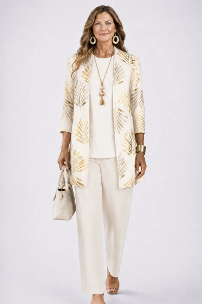 Women's 3-piece outfit set featuring a lightweight cardigan, a stylish tank top, and printed trousers, perfect for smart casual occasions. 13