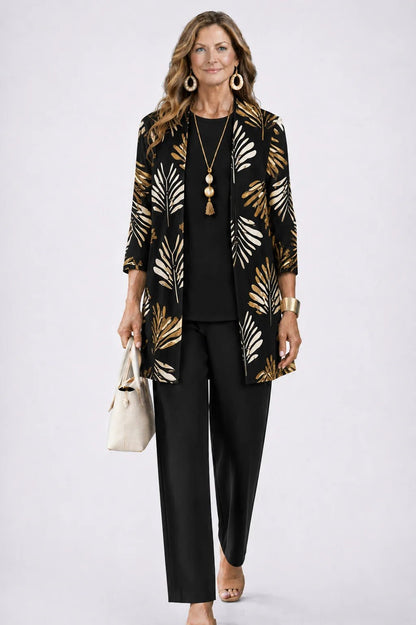 Women's 3-piece outfit set featuring a lightweight cardigan, a stylish tank top, and printed trousers, perfect for smart casual occasions. 10
