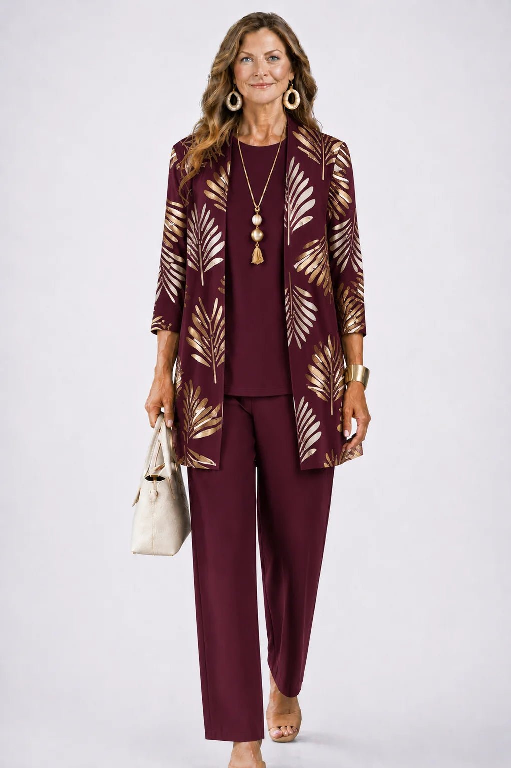 Women's 3-piece outfit set featuring a lightweight cardigan, a stylish tank top, and printed trousers, perfect for smart casual occasions. 9