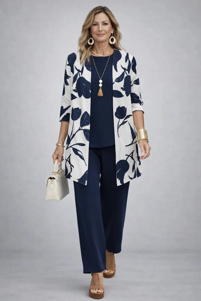 Women's 3-piece outfit set featuring a lightweight cardigan, a stylish tank top, and printed trousers, perfect for smart casual occasions. 8