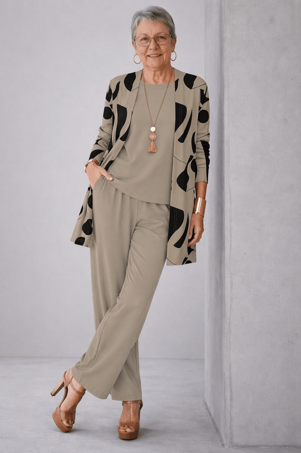 Women's 3-piece set featuring a relaxed fit cardigan, long sleeve top, and wide-leg trousers in earthy tones, perfect for casual elegance and comfort. 0