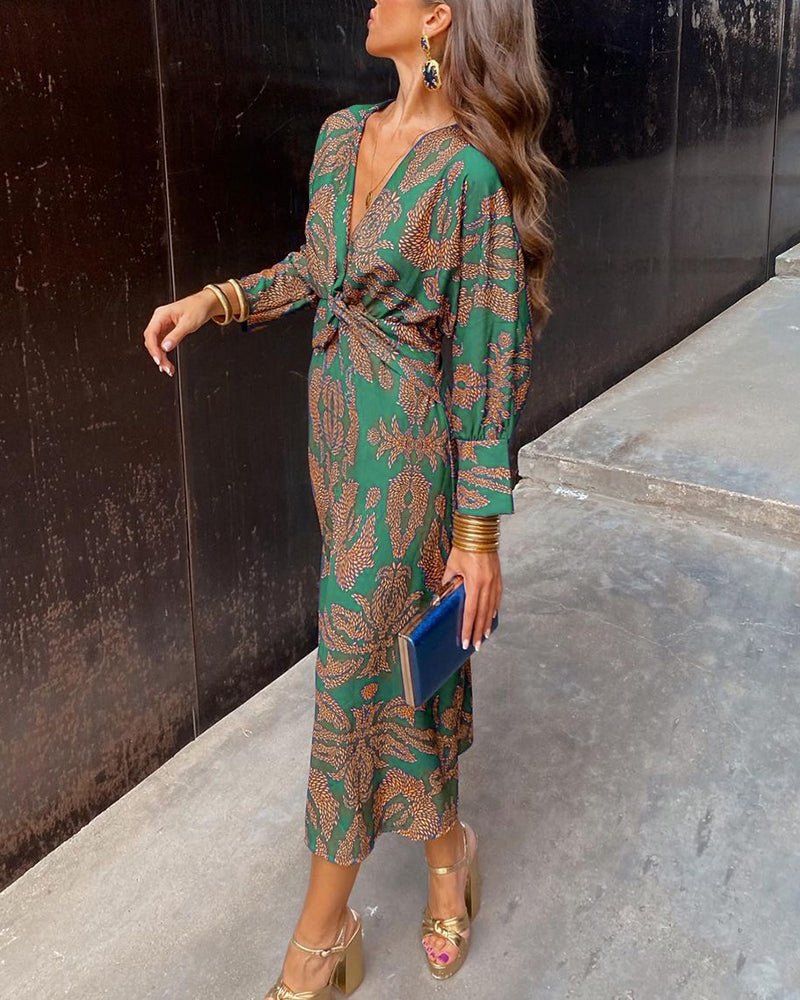 Women's A-Line Maxi Dress featuring an elegant V-neckline, designed for formal occasions with a flattering silhouette and stylish print. 1