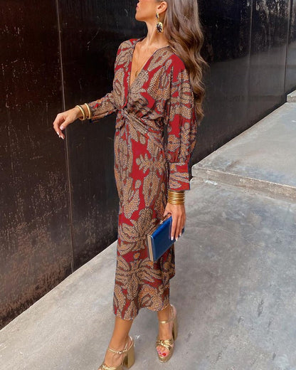 Women's A-Line Maxi Dress featuring an elegant V-neckline, designed for formal occasions with a flattering silhouette and stylish print. 2