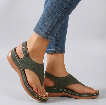 Women's ankle strap wedge sandals featuring an adjustable fit, designed for comfort and style, perfect for summer outings. 1