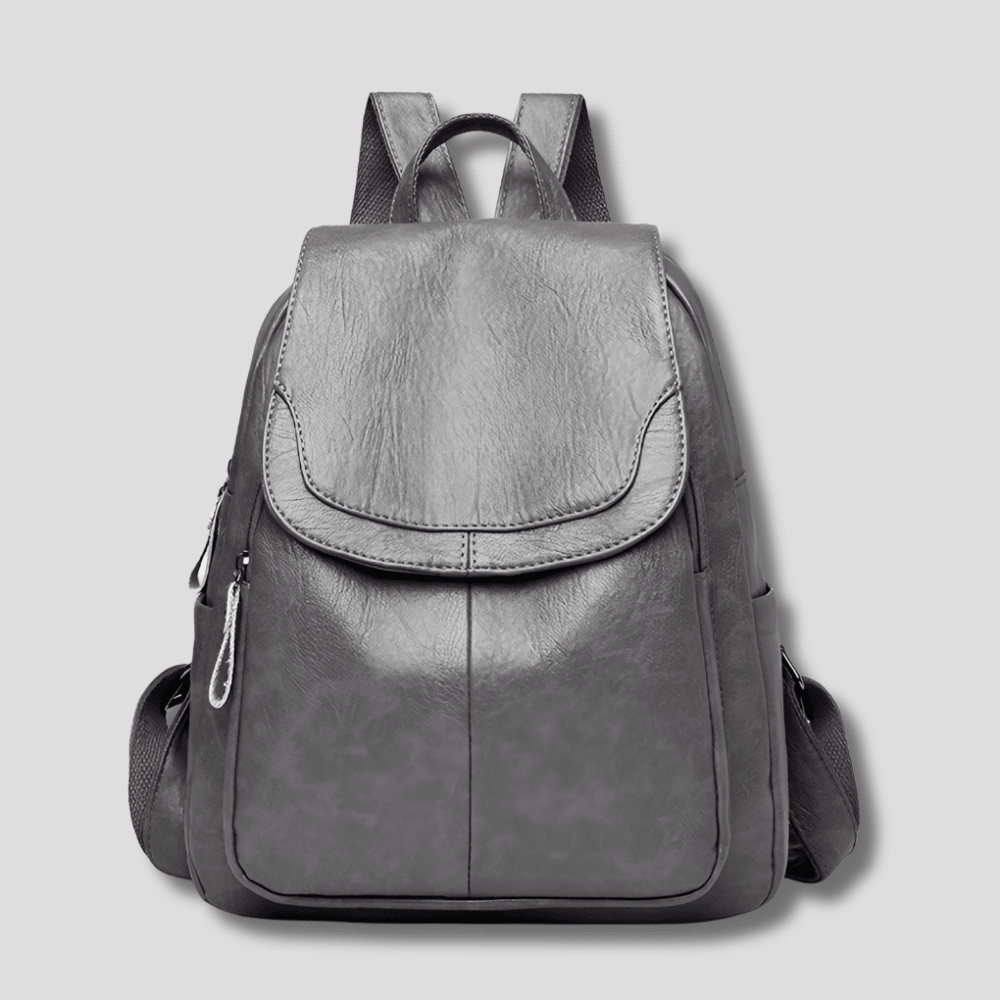 Women's anti-theft leather backpack featuring a secure zipper closure, designed as a compact daypack for everyday use, stylish and functional for daily activities. 10