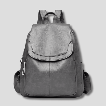 Women's anti-theft leather backpack featuring a secure zipper closure, designed as a compact daypack for everyday use, stylish and functional for daily activities. 10