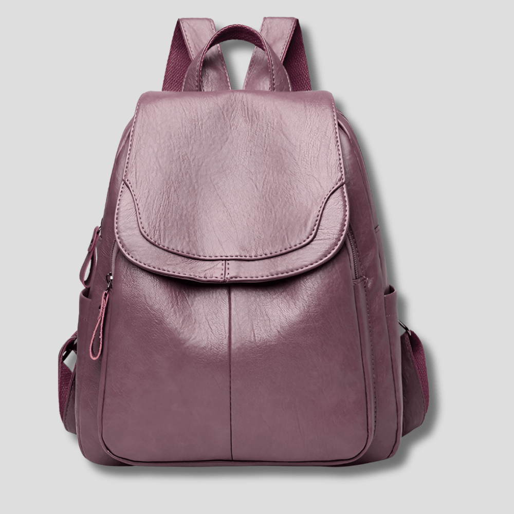 Women's anti-theft leather backpack featuring a secure zipper closure, designed as a compact daypack for everyday use, stylish and functional for daily activities. 9
