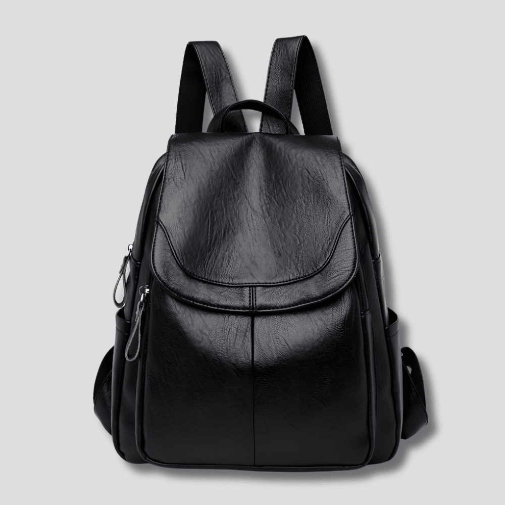 Women's anti-theft leather backpack featuring a secure zipper closure, designed as a compact daypack for everyday use, stylish and functional for daily activities. 3