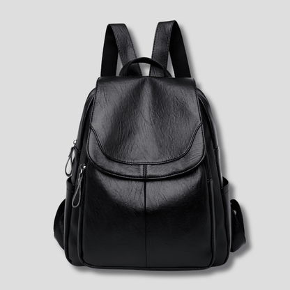 Women's anti-theft leather backpack featuring a secure zipper closure, designed as a compact daypack for everyday use, stylish and functional for daily activities. 3