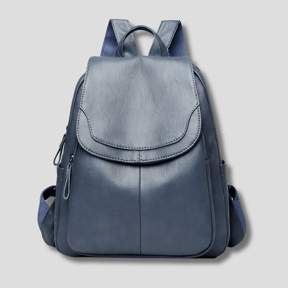 Women's anti-theft leather backpack featuring a secure zipper closure, designed as a compact daypack for everyday use, stylish and functional for daily activities. 1