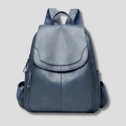 Women's anti-theft leather backpack featuring a secure zipper closure, designed as a compact daypack for everyday use, stylish and functional for daily activities. 1