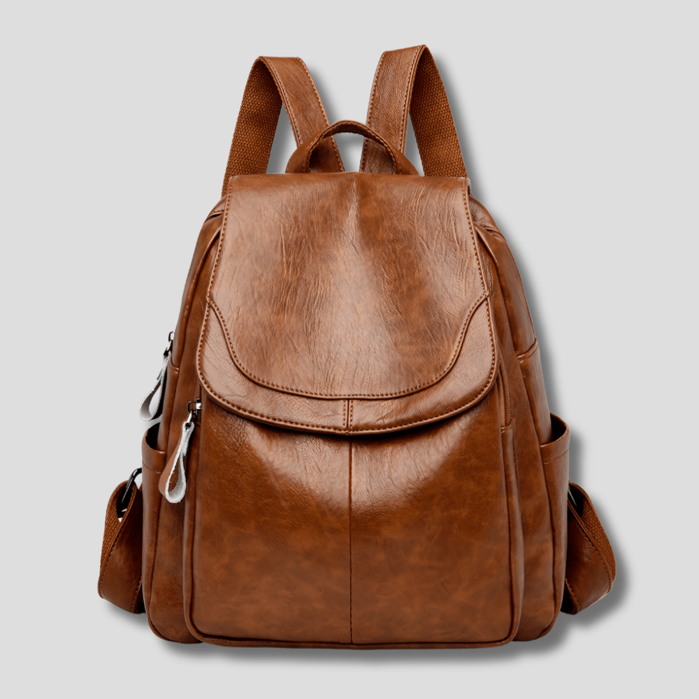 Women's anti-theft leather backpack featuring a secure zipper closure, designed as a compact daypack for everyday use, stylish and functional for daily activities. 6