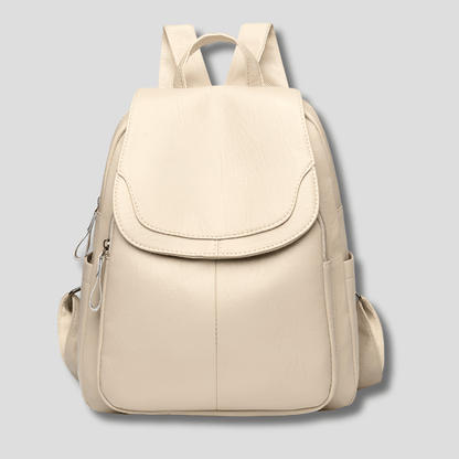 Women's anti-theft leather backpack featuring a secure zipper closure, designed as a compact daypack for everyday use, stylish and functional for daily activities. 7