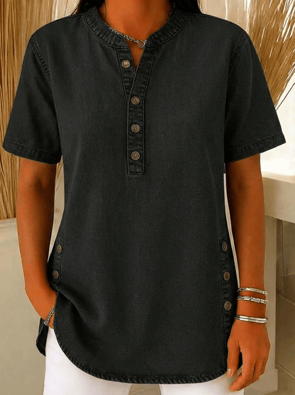 Women's relaxed fit blouse featuring a Henley neckline and short sleeves, made from a soft cotton blend for casual comfort and style. 2