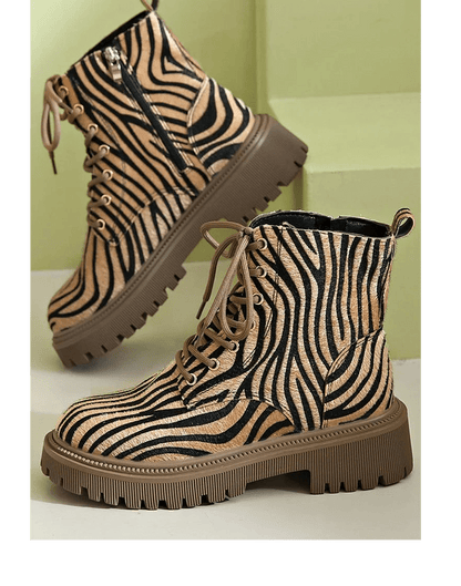 Women's zebra print khaki lace-up boots featuring a sleek silhouette, perfect for stylish and trendy fall and winter outfits. 0