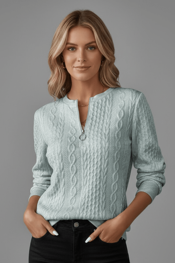 Women's cable knit jumper featuring a stylish zip neck, designed for casual comfort with long sleeves, perfect for everyday wear. 6