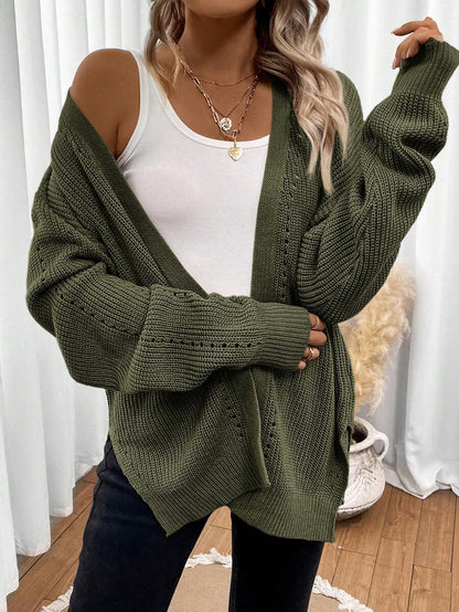 Women's white cardigan featuring pointelle knit design and drop shoulders, perfect for casual layering in any season. 1