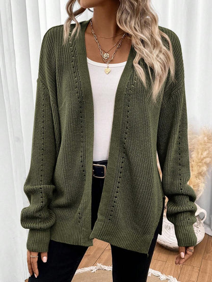 Women's white cardigan featuring pointelle knit design and drop shoulders, perfect for casual layering in any season. 0
