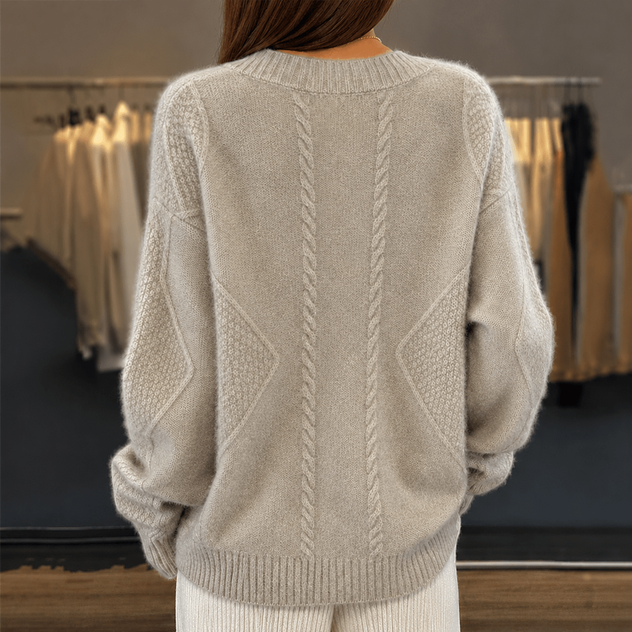 Women's cardigan featuring a stylish V-neck design, crafted from a soft wool-blend fabric, perfect for cozy layering in any season. 3