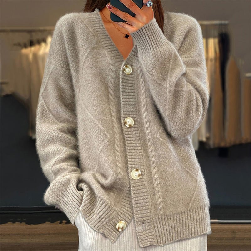 Women's cardigan featuring a stylish V-neck design, crafted from a soft wool-blend fabric, perfect for cozy layering in any season. 2