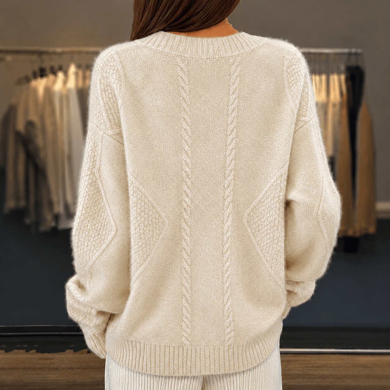 Women's cardigan featuring a stylish V-neck design, crafted from a soft wool-blend fabric, perfect for cozy layering in any season. 5
