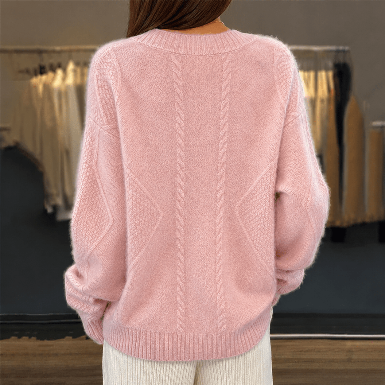 Women's cardigan featuring a stylish V-neck design, crafted from a soft wool-blend fabric, perfect for cozy layering in any season. 1