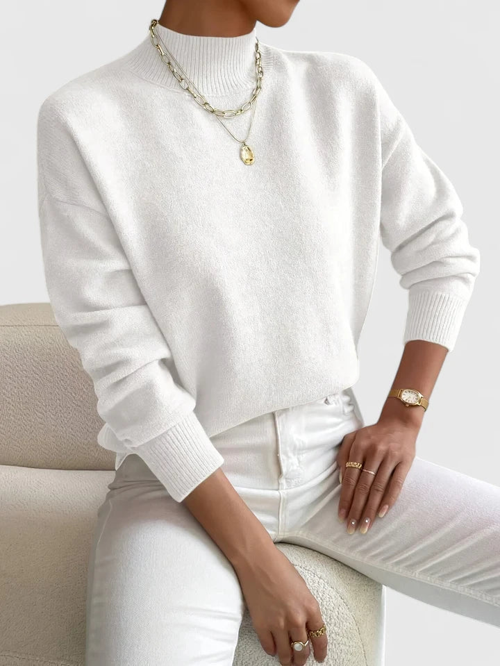 Women's cashmere turtleneck sweater in elegant black, featuring a cozy knit design perfect for timeless style and comfort. 0