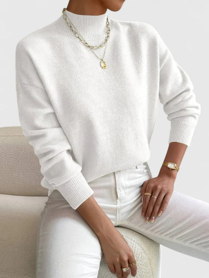 Women's cashmere turtleneck sweater in elegant black, featuring a cozy knit design perfect for timeless style and comfort. 0