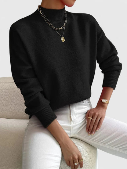 Women's cashmere turtleneck sweater in elegant black, featuring a cozy knit design perfect for timeless style and comfort. 1