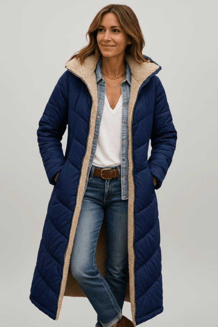 Women's quilted long winter coat with fixed hood and zip closure, designed for warmth and style during cold weather. 4