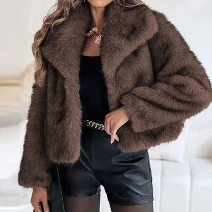 Women's cropped faux fur jacket with an open front, featuring a soft plush texture, perfect for autumn and winter layering. 2