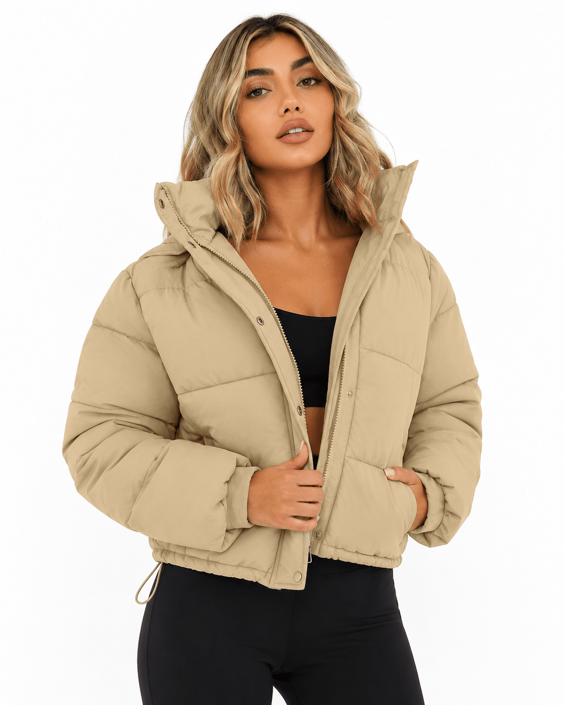 Women's cropped hooded puffer jacket featuring a zip closure and quilted insulated design, perfect for winter warmth and style. 2