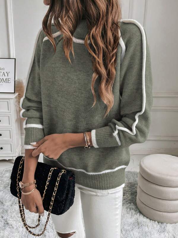 Women's cropped turtleneck jumper featuring a stylish ribbed knit texture and trendy striped sleeves, perfect for a fashionable and cozy look. 3