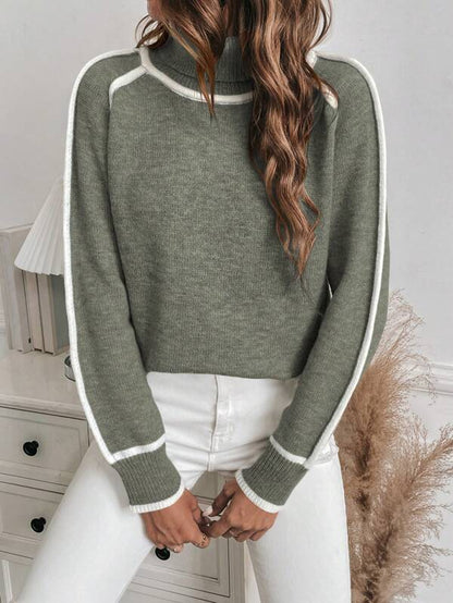 Women's cropped turtleneck jumper featuring a stylish ribbed knit texture and trendy striped sleeves, perfect for a fashionable and cozy look. 0
