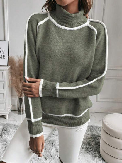 Women's cropped turtleneck jumper featuring a stylish ribbed knit texture and trendy striped sleeves, perfect for a fashionable and cozy look. 2