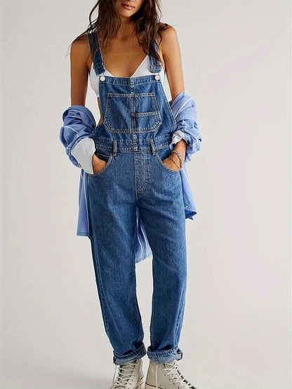 Women's denim jumpsuit featuring a casual relaxed fit, designed with functional pockets, perfect for all seasons. 3