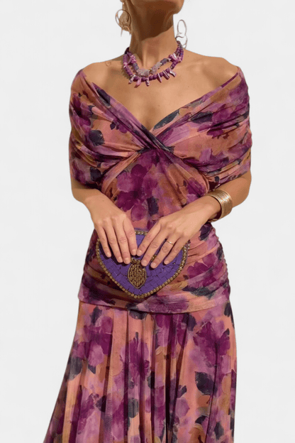 Elegant women's wedding guest dress featuring a V-neck floral design, pleated waist, and a long flowing skirt, perfect for special occasions. 11