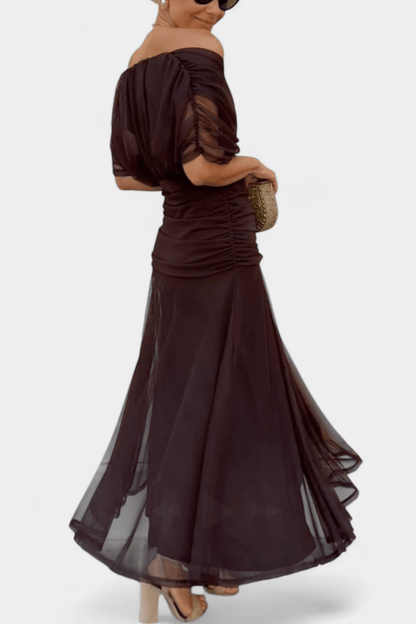 Elegant women's wedding guest dress featuring a V-neck floral design, pleated waist, and a long flowing skirt, perfect for special occasions. 2