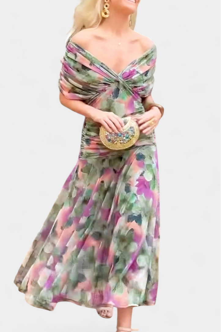 Floral print women's dress for weddings and events featuring a V-neckline, pleated waist, and a long flowing skirt. 8