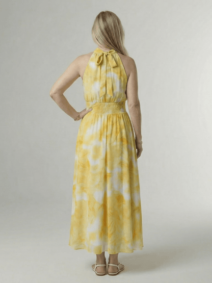 Lightweight summer midi dress for women featuring a sleeveless halter design, perfect for warm weather outings. 3