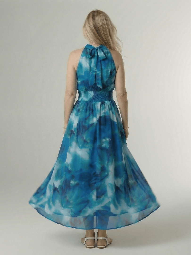 Lightweight summer midi dress for women featuring a sleeveless halter design, perfect for warm weather outings. 7
