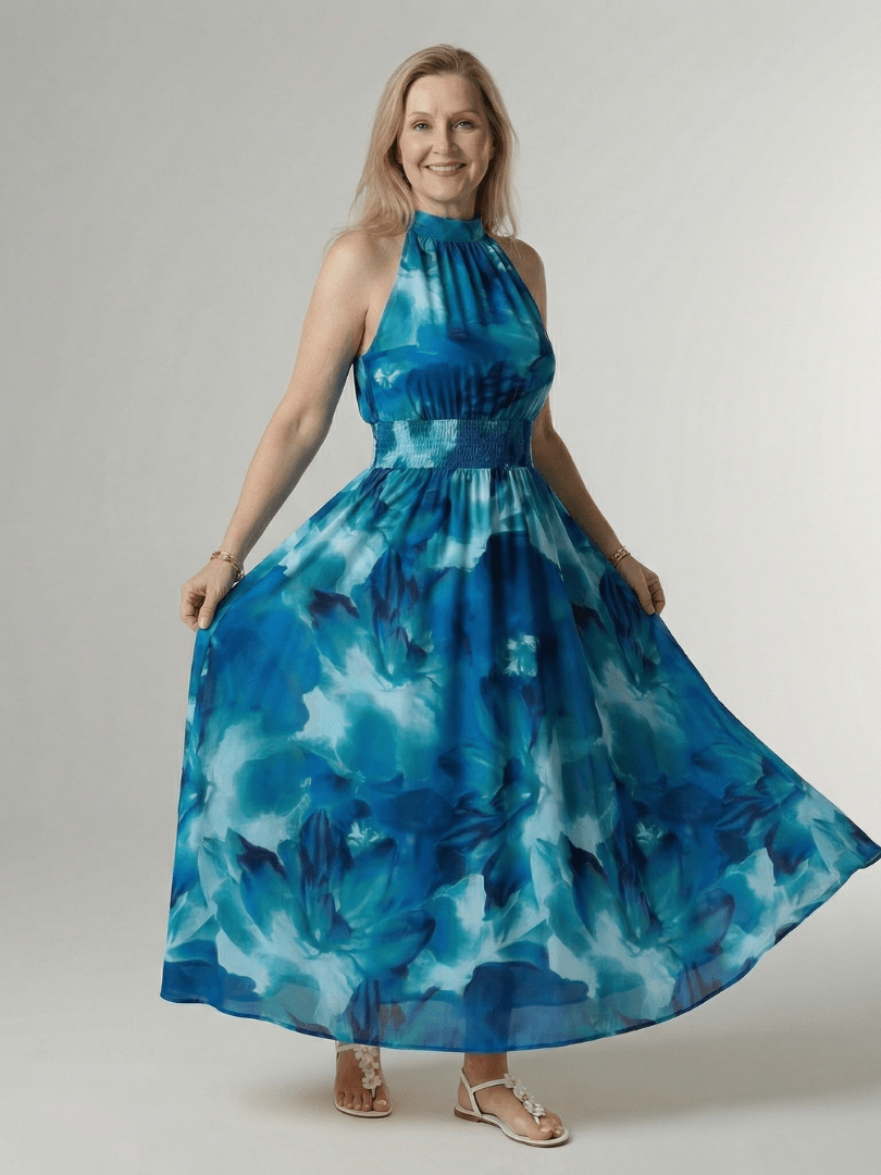 Lightweight summer midi dress for women featuring a sleeveless halter design, perfect for warm weather outings. 4