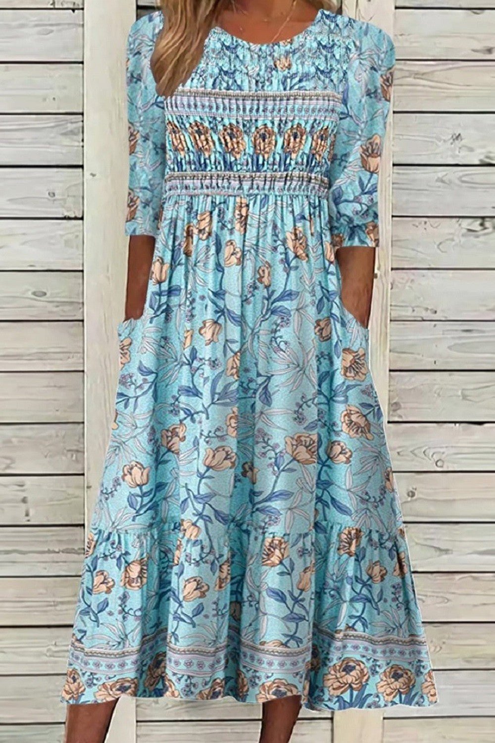 Womens casual summer dress featuring a breezy silhouette and round neckline, made from an airy polyester blend for comfort and style. 0