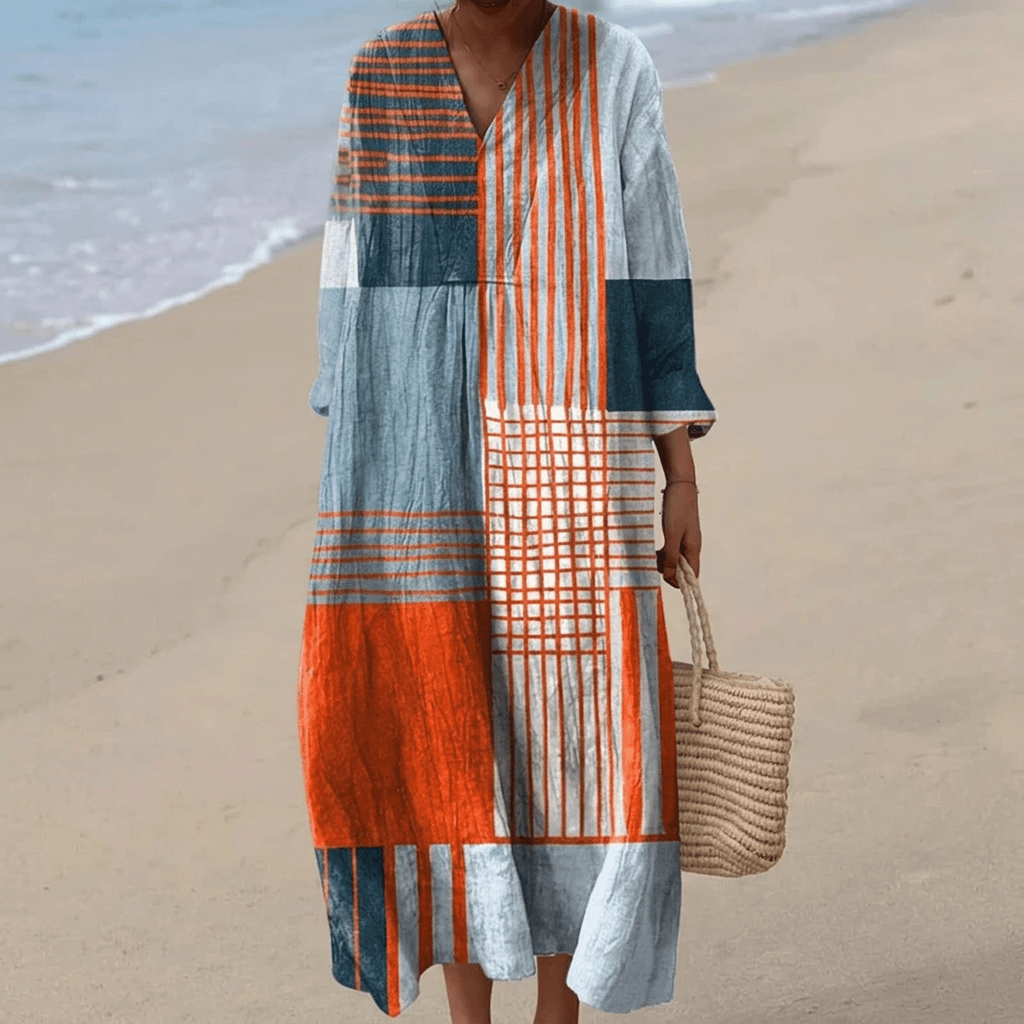 Elegant women's mid-length dress with a chic loose fit, perfect for summer and formal occasions, featuring a stylish design and comfortable fabric. 10